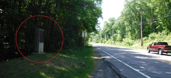 Marker 8 of the Henry Knox Trail at the crossing of Bloody Pond Road and Route 9 south of Lake George
